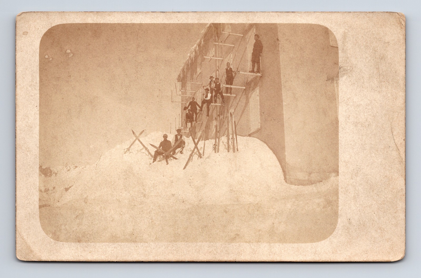 Unknown Location Men Skiers Boulding At Snowy Mountain Top Postcard
