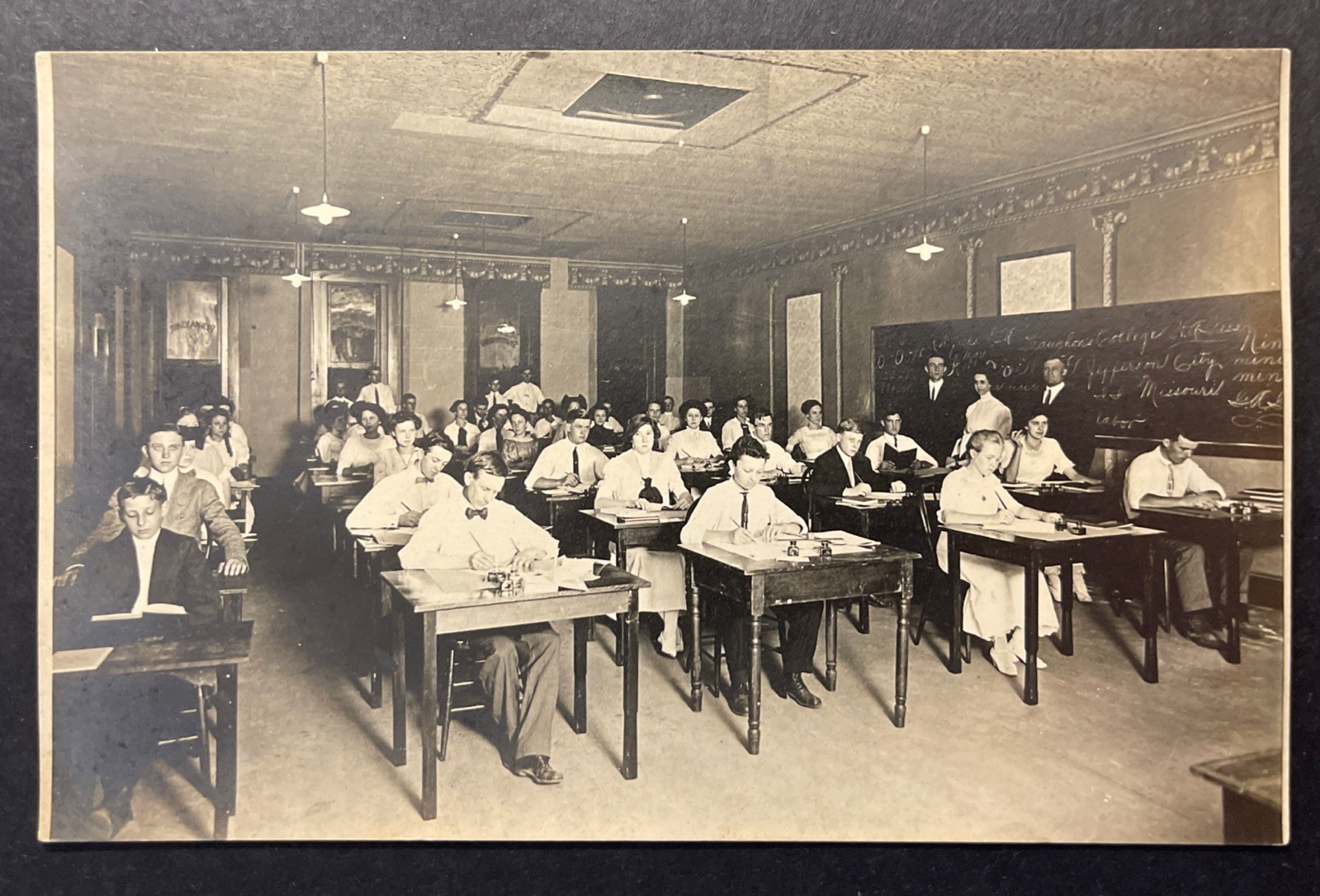 Draughon’s College Jefferson City MO is written on the blackboard RPPC CYKO