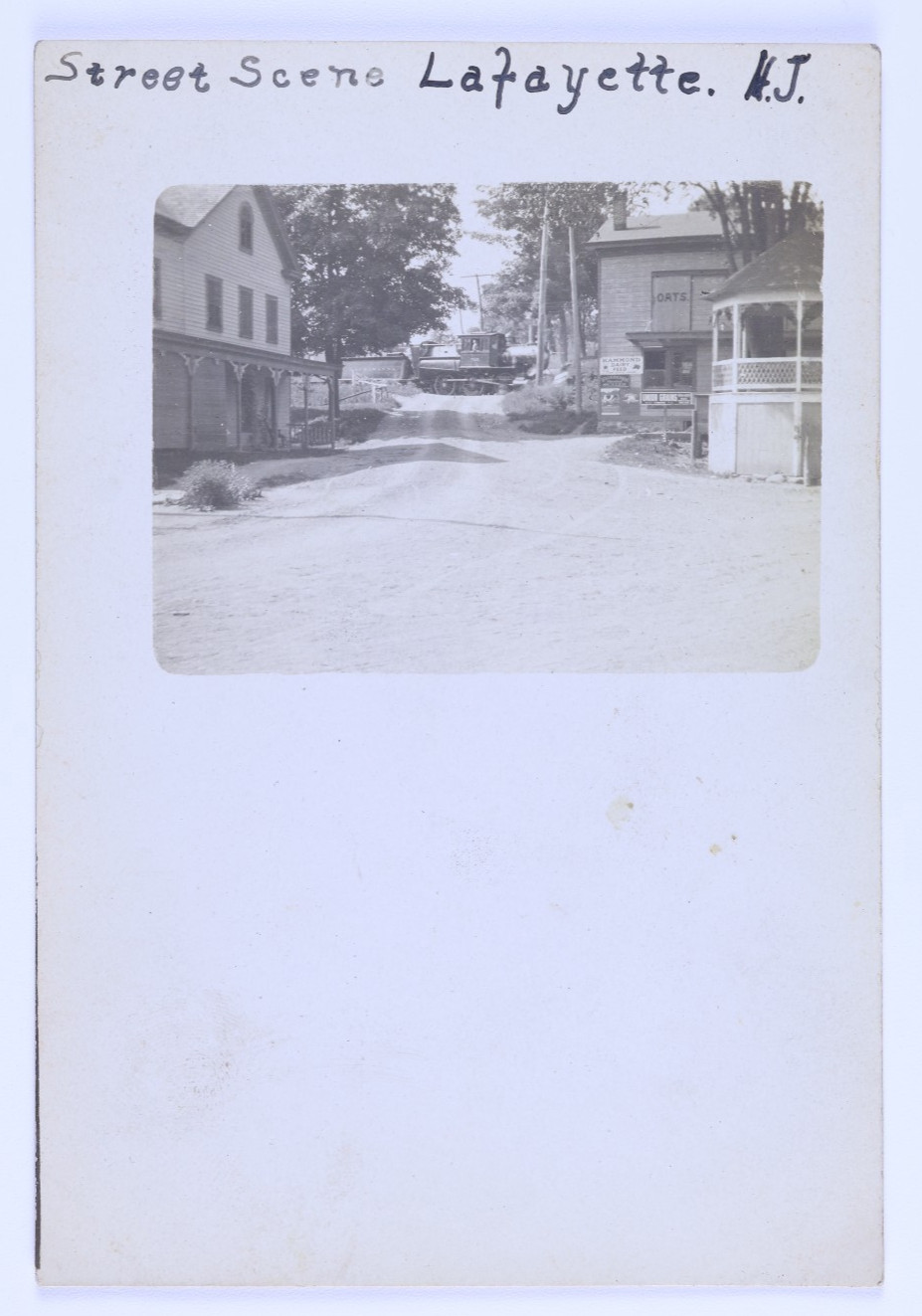 RPPC Lafayette NJ Street Scene Lackawanna Railroad Train Hammond Feed Store Sign