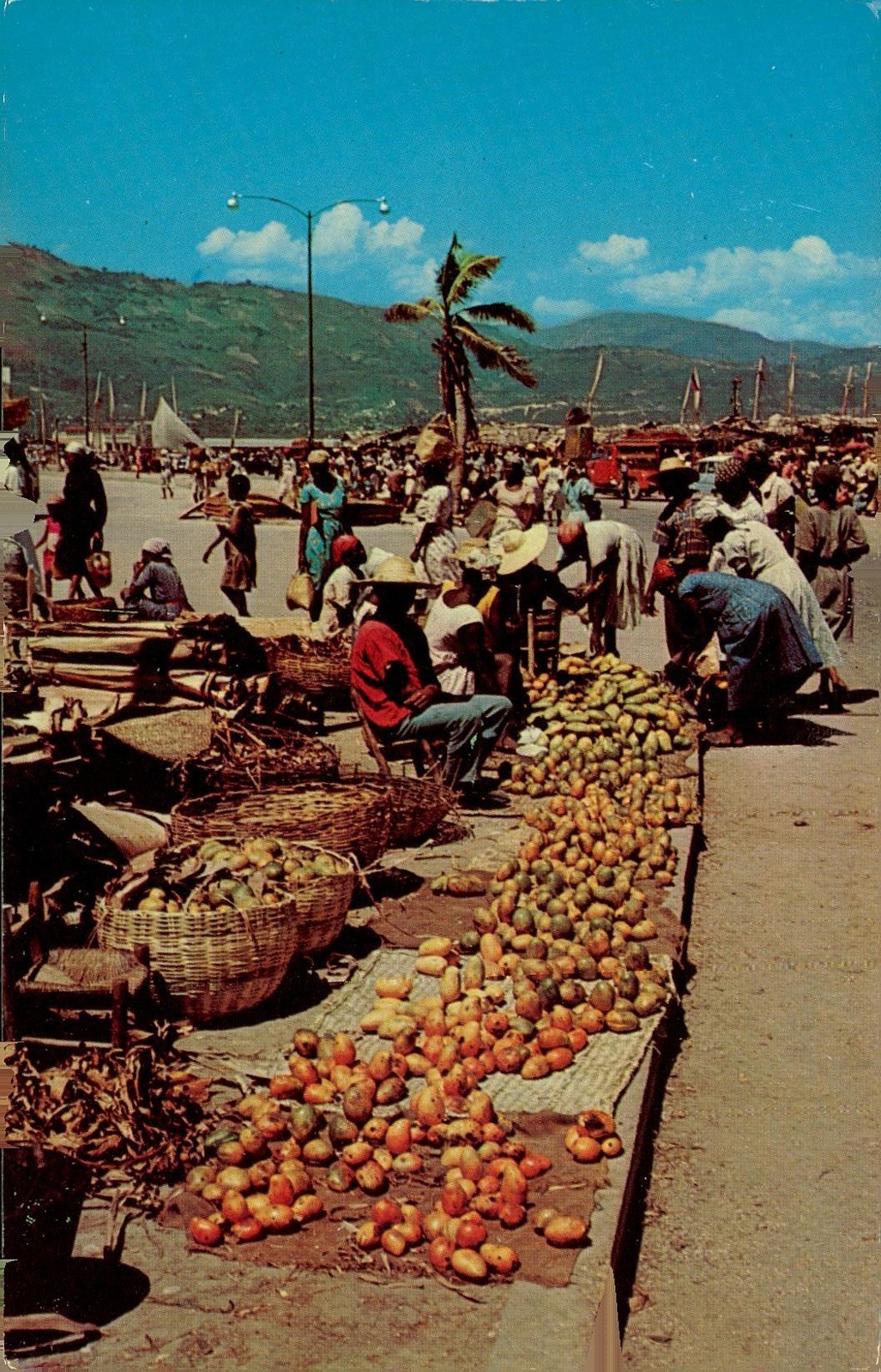 Mangoes for sale at street market, c1950, Port-au-Prince, Dexter Press, Inc.