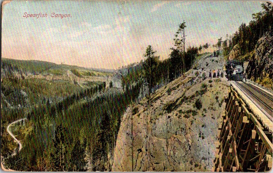 Spearfish SD postcard TRAIN ON TRESTLE BRIDGE EXITING TUNNEL CANYON j/05 AW4238
