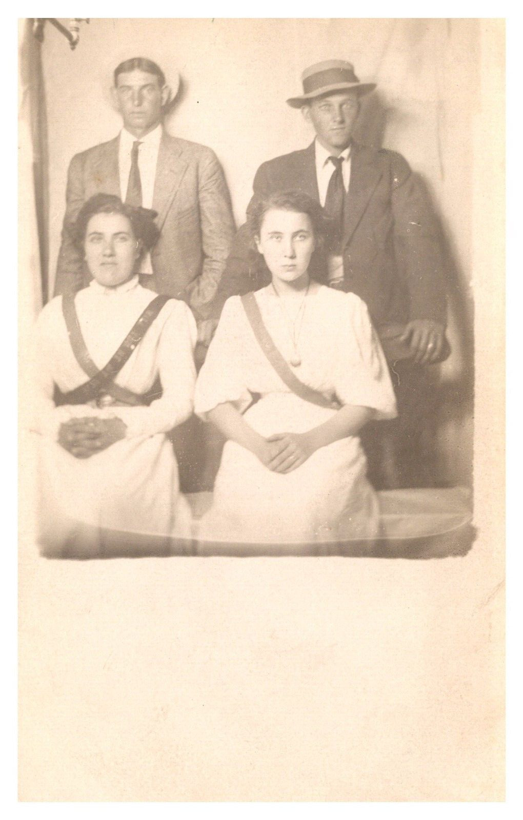postcard two couples in a picture next to a vent shutoff valve. c1907-1915 2876