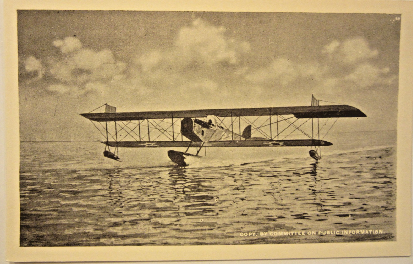 1910 ? Biplane – Sea Plane landing on water. Cyko stamp box, 5 1/2″ x 3 1/2″.