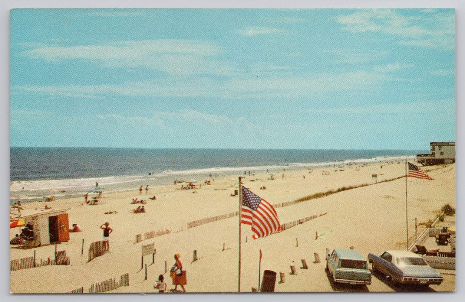 Fenwick Island Delaware DE Beach Sunbathing Cars Flag Postcard by FW Brueckmann