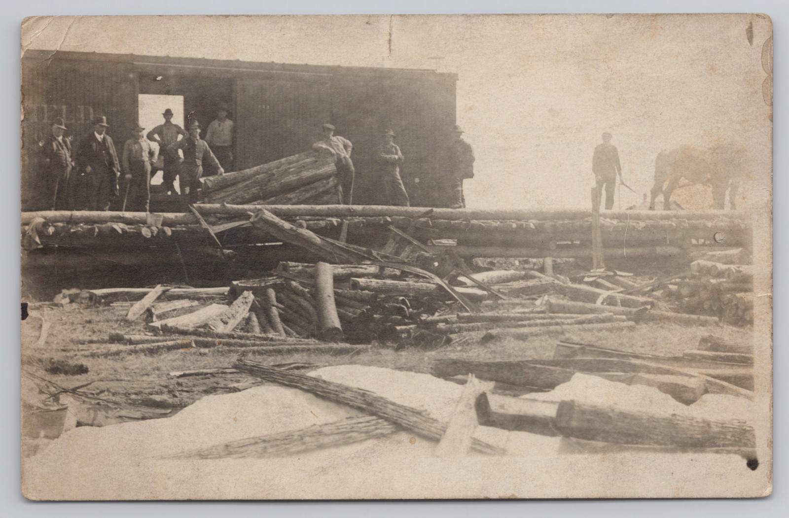 Postcard RPPC Men On the Loading Dock Cincinnati Traction Company Fairmont, IN.