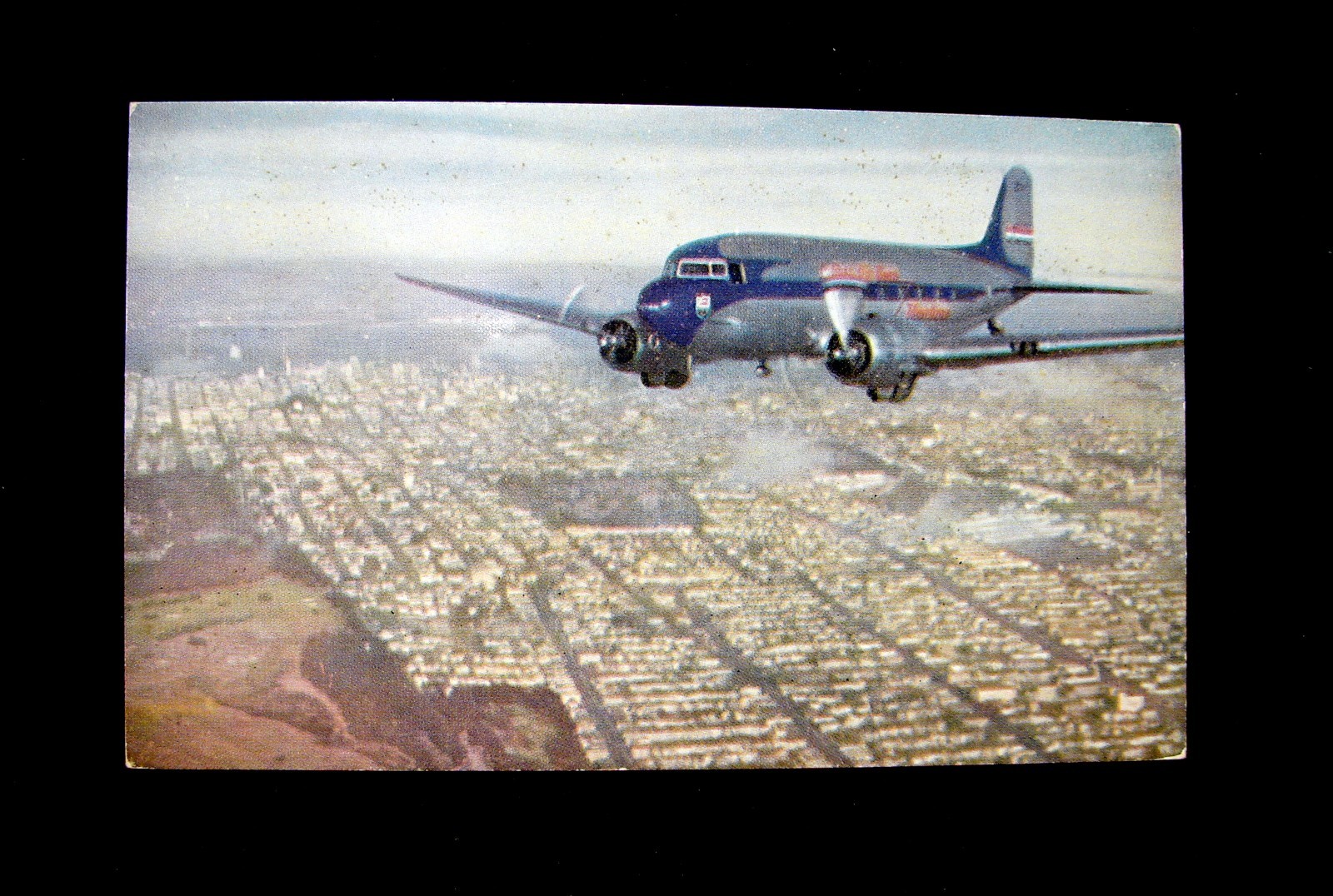 VINTAGE POSTCARD “UNITED AIR LINES MAINLINER AIRPLANE IN FLIGHT”