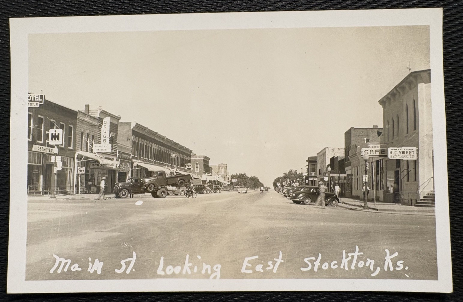 RPPC Main Street Looking East, Stockton, Kansas Ks Postcard